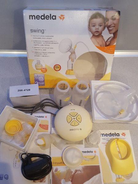 Sprzedam laktator medela swing + gratisy !!