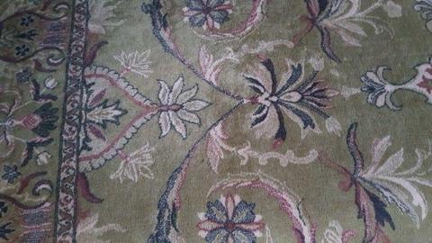 Orientalny wełniany dywan