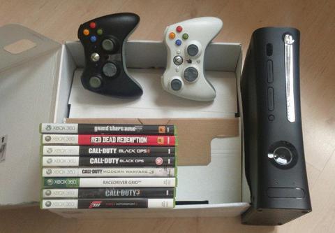 Xbox 360, 2 pady i 8 gier (GTA V, Red Dead Redemption, Call of Duty Black Ops II i inne)