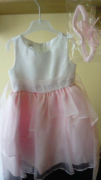 Sukienka balowa w kolorze różowym z USA
