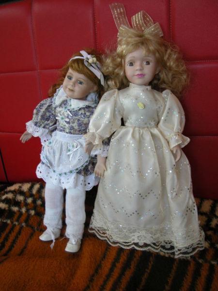 dwie śliczne lalki porcelanowe