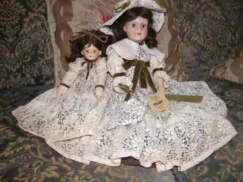 dwie stare lalki porcelanowe wupper